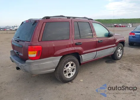 2000 Jeep Grand Cherokee Laredo from USA, damaged, VIN 1J4GW48S2YC395412